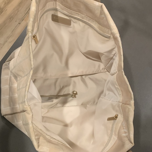 Authentic Chanel beige travel line canvas and leather tote. Date code is 8358878 - Picture 11 of 16